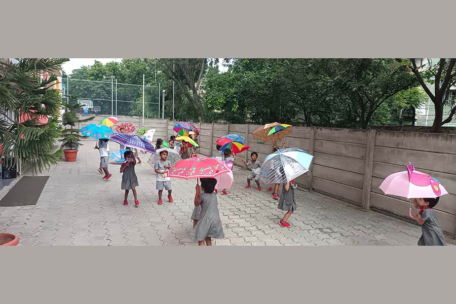 umbrella day image - Yuvabharathi Nursery